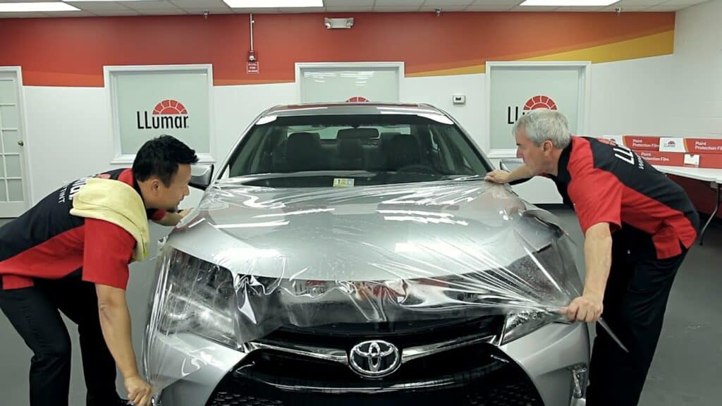 Paint protection film being installed on car in Henderson