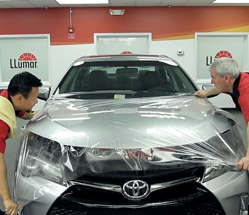 Precision Window Tint 8 Paint protection film being installed on car in Henderson